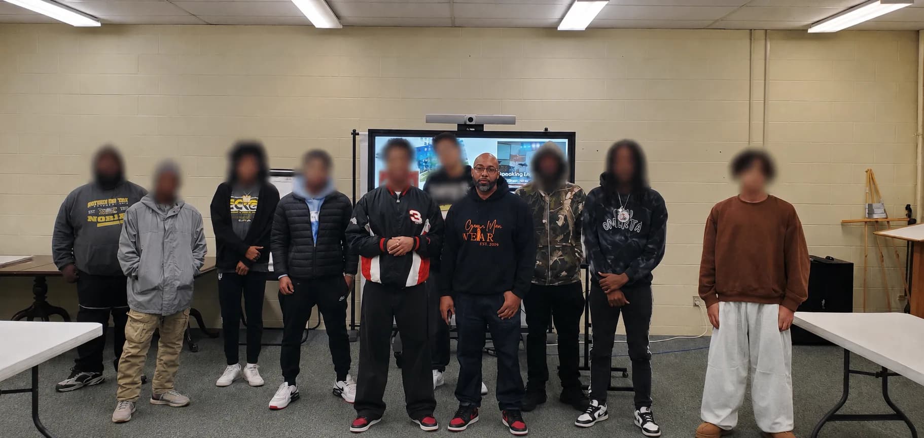 The A.C.C.O.U.N.T. Model™ facilitator and the group of young men Legacy Builders invited him to speak to.